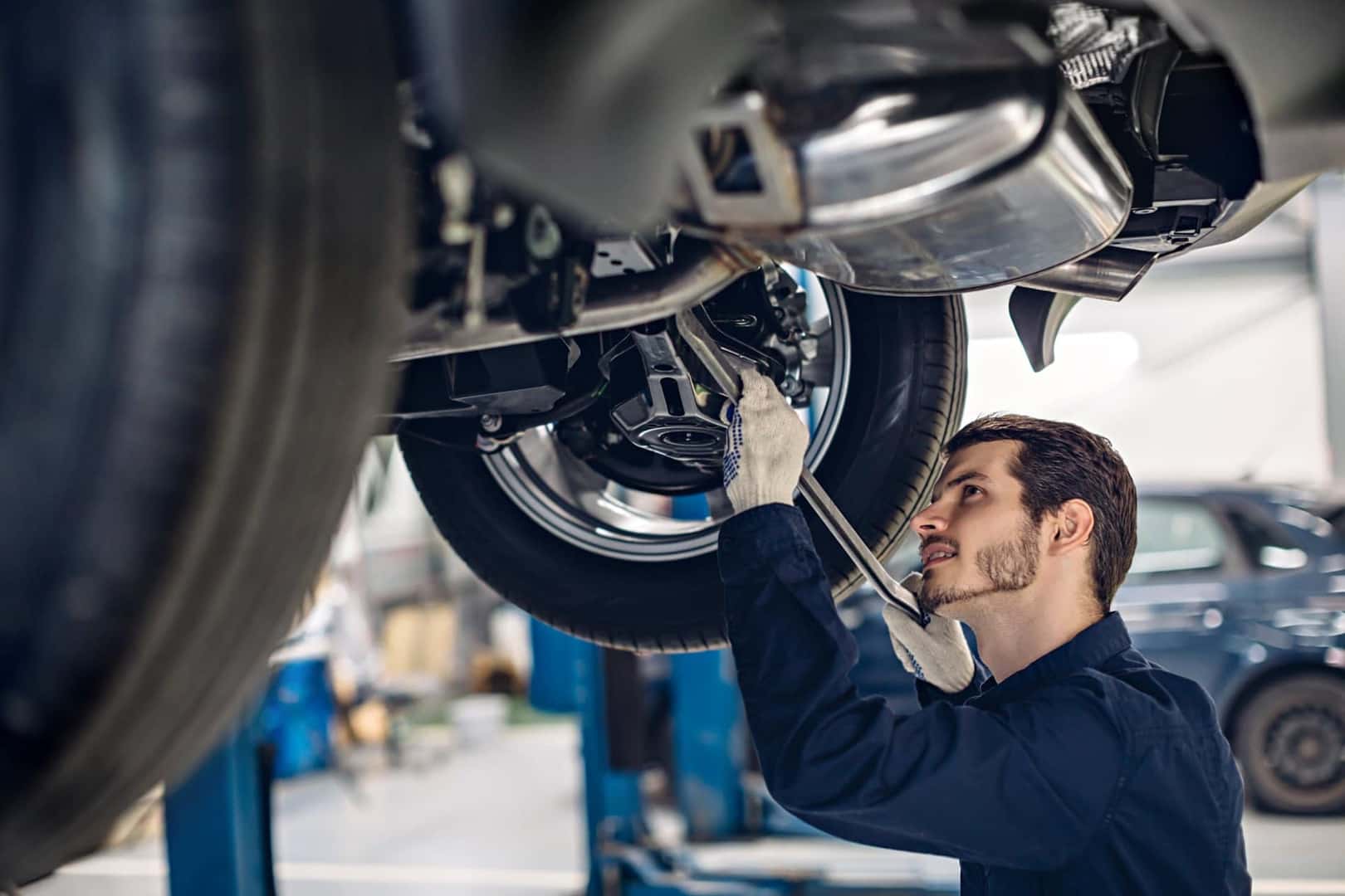 guy repairing a car