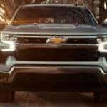 2024-Chevy-Silverado-1500-driving-through-a-wooded-path