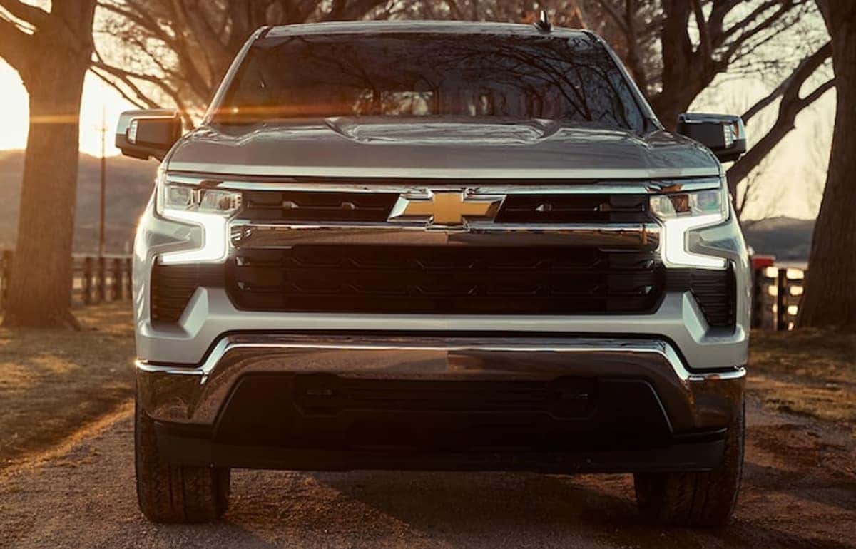 2024-Chevy-Silverado-1500-driving-through-a-wooded-path