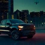 2025-Chevy-Silverado-1500-parked-at-an-empty-space-at-night