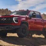 2025-Chevy-Silverado-HD-parked-on-a-rough-terrain