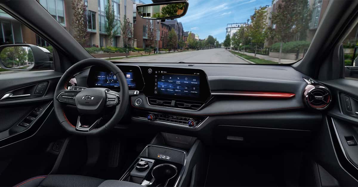 interior of the 2026 Chevy Equinox with a view of a neighborhood