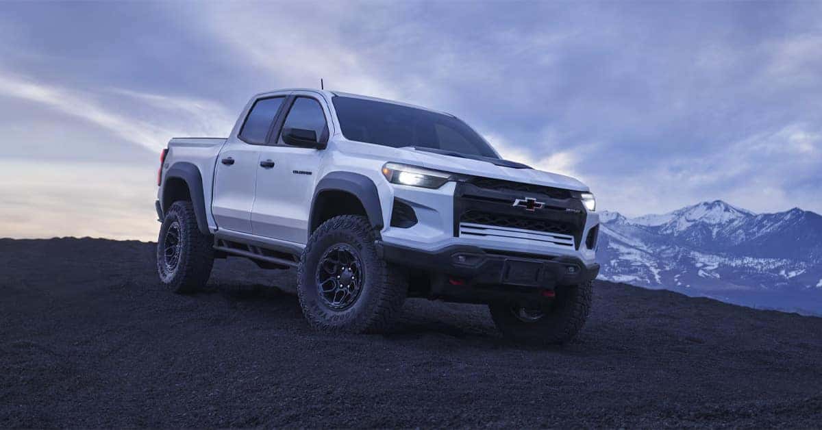 A white 2026 Chevy Colorado on a hill