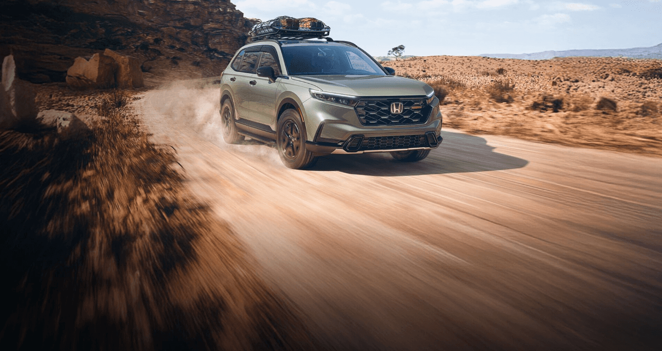 2026 Honda CR-V on a dirt road in a desert setting