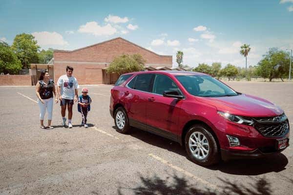 Family walking to 2019 Chevy Equinox