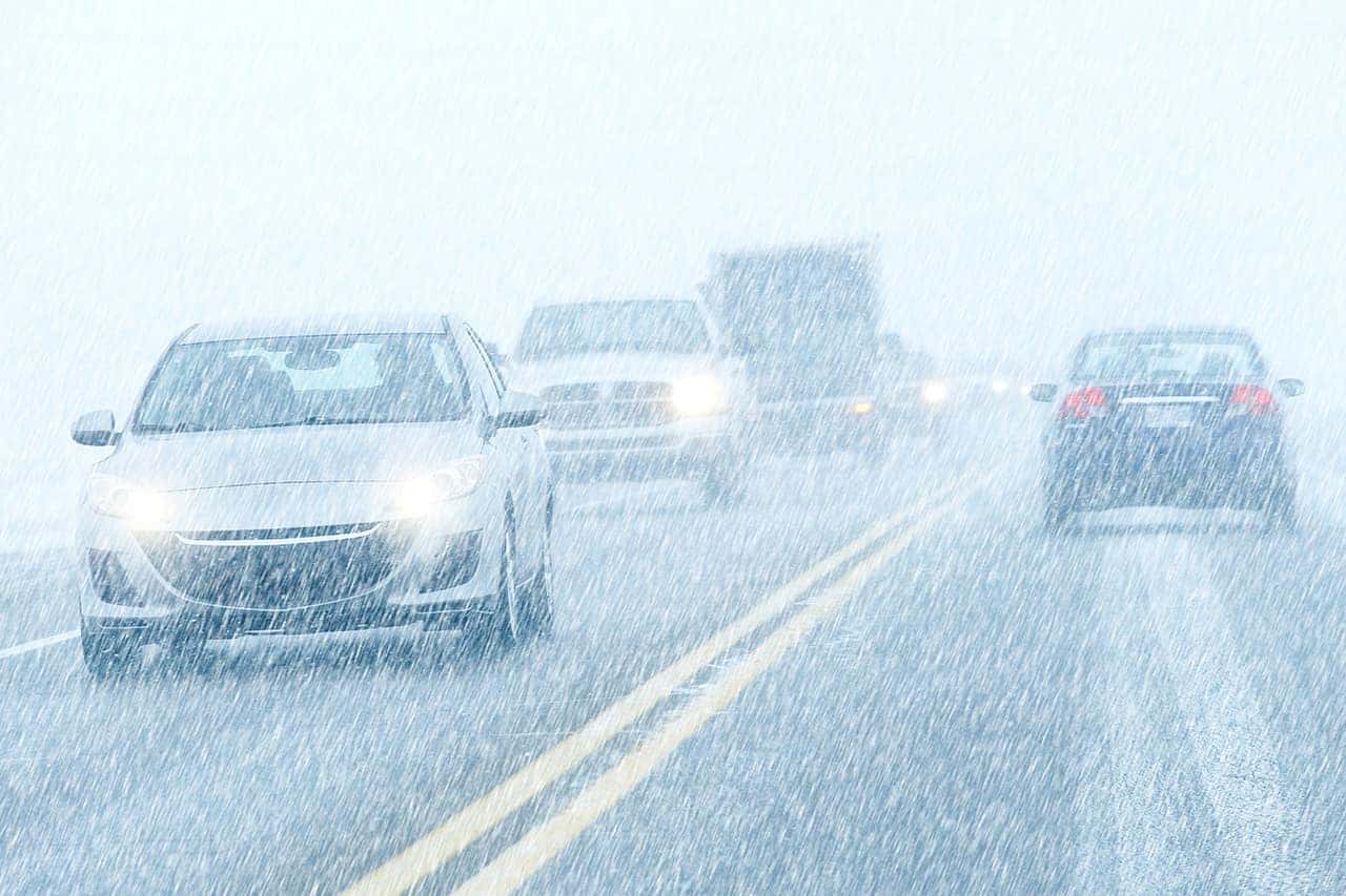 Cars driving in snowstorm