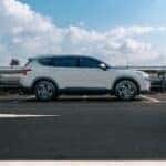hyundai santa fe on a parking lot under the cloudy sky