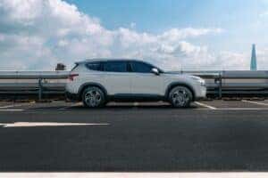 hyundai santa fe on a parking lot under the cloudy sky