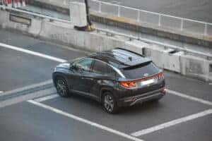 hyundai tucson suv parked in a parking lot