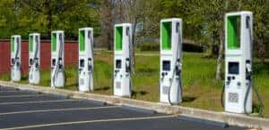 a row of ev charging stations in a parking lot