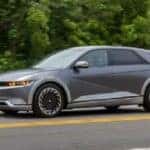 silver 2024 Hyundai IONIQ 5 driving on a road