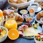 a platter of breakfast food prepared for a brunch