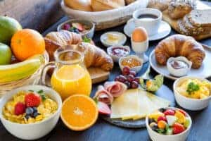 a platter of breakfast food prepared for a brunch