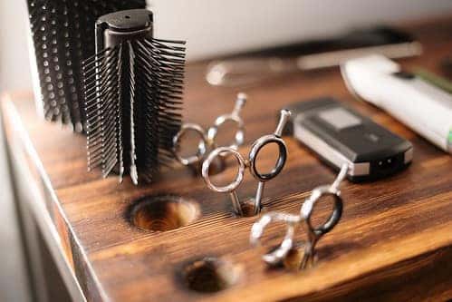 image of hair brush and scissors