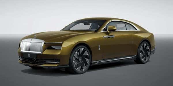 Gold Rolls-Royce Spectre Parked