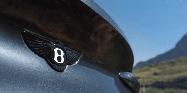 A close up detail shot of Bentley badge
