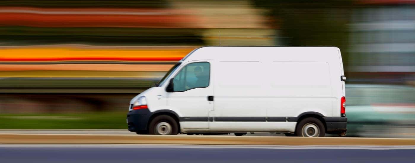 box truck driving down road