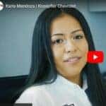 Karla Mendoza Sitting at Sales Desk at Knoepfler Chevrolet Sioux City