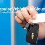 Knoepfler Team Member Holding Chevy Car Keys