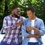 Dad giving keys to teen driver