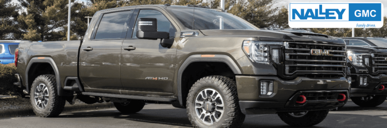 Nalley GMC dealership exterior with new GMC trucks for sale in Brunswick, GA