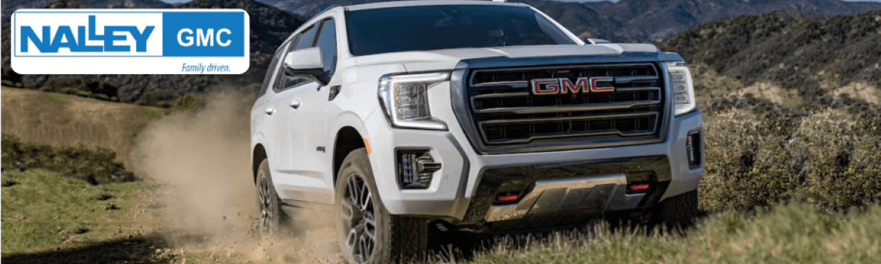 Exterior view of Nalley GMC dealership showcasing the latest 2025 GMC Yukon models.