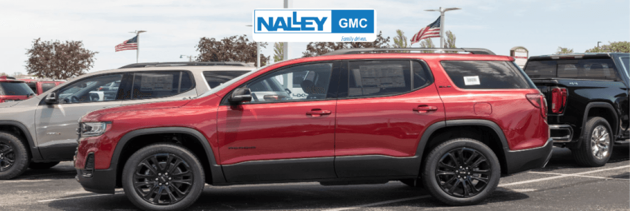 The Nalley GMC dealership exterior features a lineup of new GMC vehicles in Brunswick, GA.