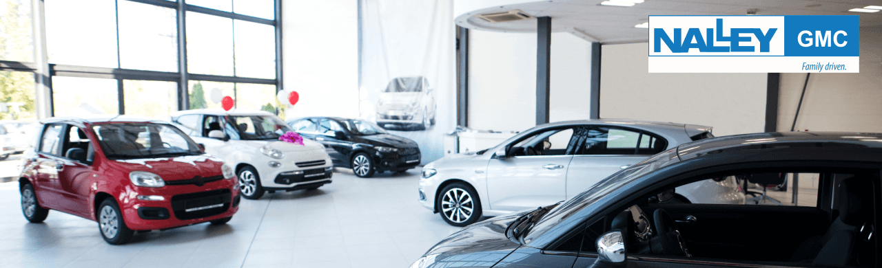 Nalley GMC dealership exterior in Brunswick, GA, showcasing pre-owned cars.