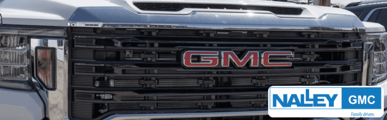 Front view of Nalley GMC dealership in Brunswick, GA, showcasing a vibrant lot of GMC vehicles.