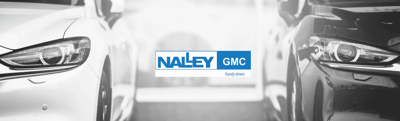 Nalley GMC dealership exterior showcasing a welcoming entrance and well-maintained lot filled with used cars in Brunswick, GA.