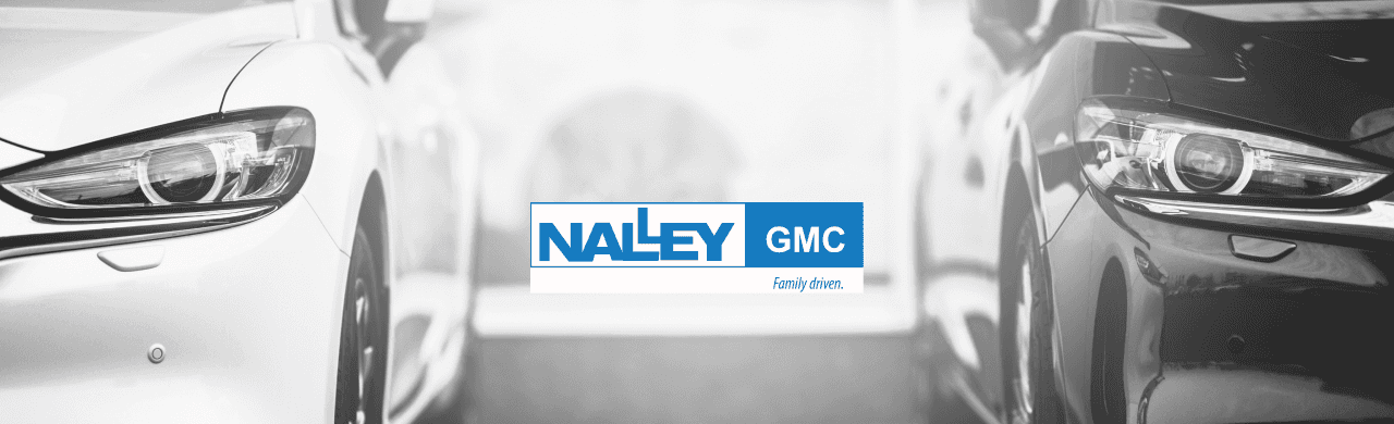 The Nalley GMC dealership's exterior showcases various cars for sale in Brunswick, GA.