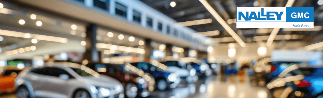 Nalley GMC dealership in Savannah, GA, showcasing a variety of quality used vehicles on the lot.