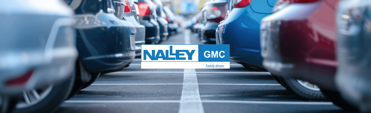 Nalley GMC dealership in Brunswick, GA, showcasing a variety of used cars for sale.