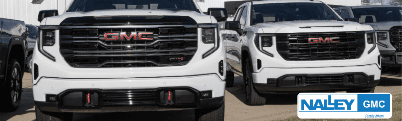 A sleek 2023 GMC Sierra 1500 parked in front of Nalley GMC's dealership in Brunswick, GA.