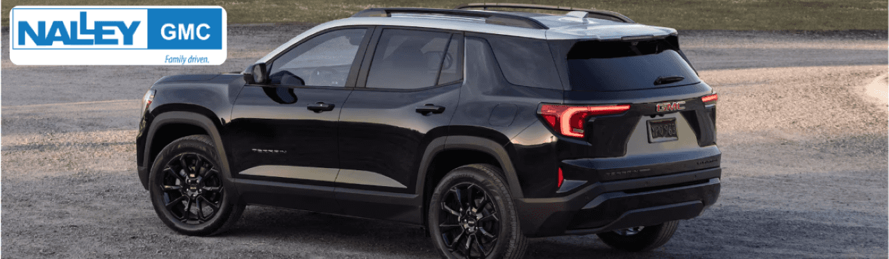 A sleek GMC Terrain SUV parked outdoors, showcasing its stylish design and advanced features.