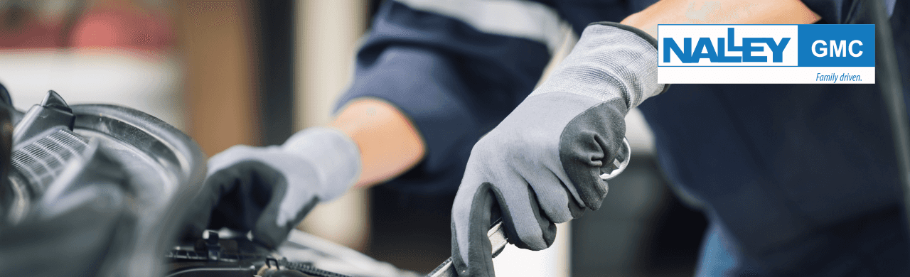 Certified GMC technicians performing expert vehicle maintenance at Nalley GMC in Brunswick, GA.
