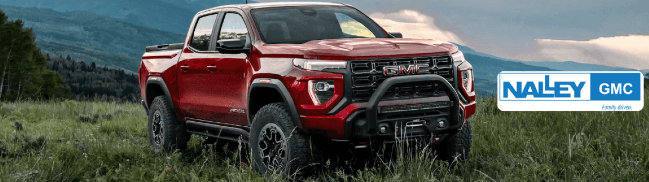 Close-up of a GMC truck showcasing its sleek design and performance features.