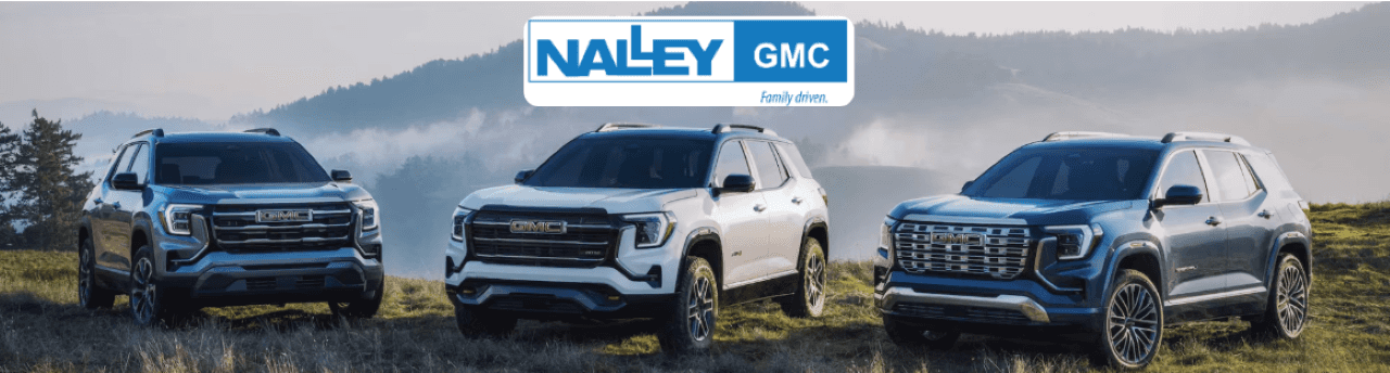 Front view of the GMC Terrain GMC SUV parked outside Nalley GMC with modern design and bold styling.