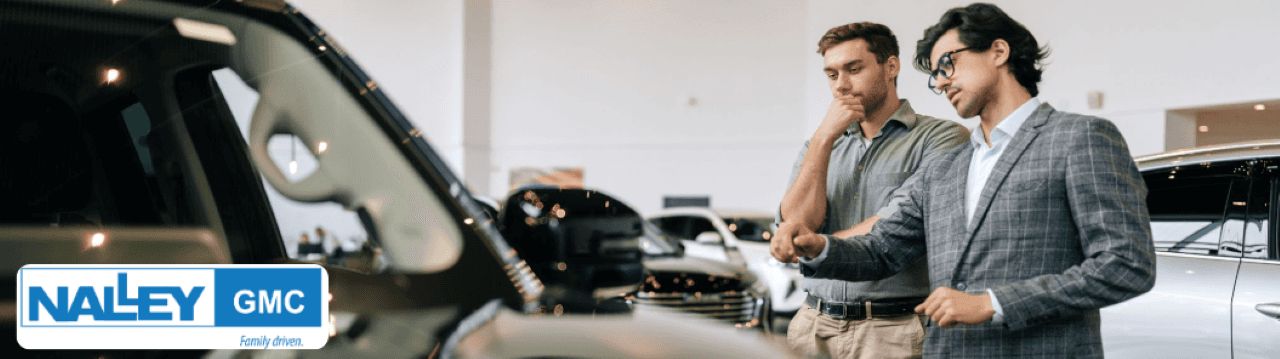 Customer trading in a vehicle at Nalley Brunswick GMC using Max Allowance near Charleston, SC.