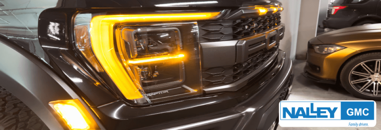 Nalley Brunswick GMC dealership lot showcases a variety of new GMC models and quality used vehicles.