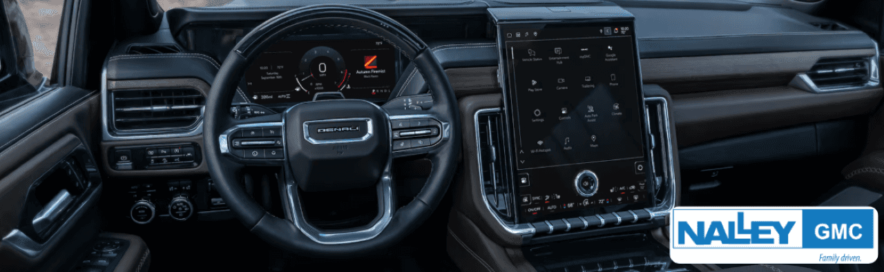 Interior shot of the Yukon Denali highlighting luxury seating and advanced tech features.