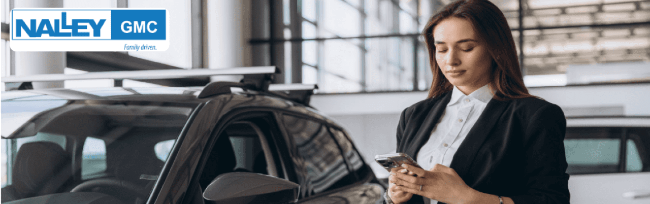 A customer at Nalley Brunswick GMC is receiving a trade-in appraisal for their vehicle.