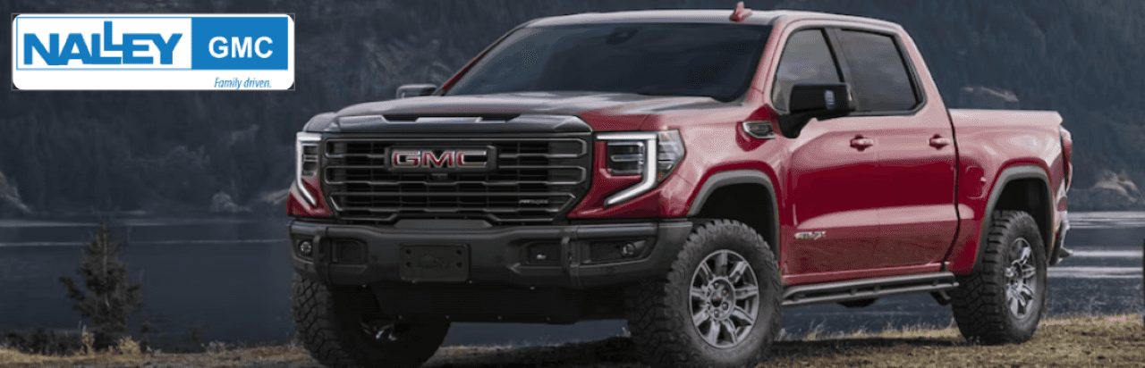 Front grille of the 2025 GMC Sierra 1500 shown in Brunswick, GA, emphasizing its bold design and rugged performance.
