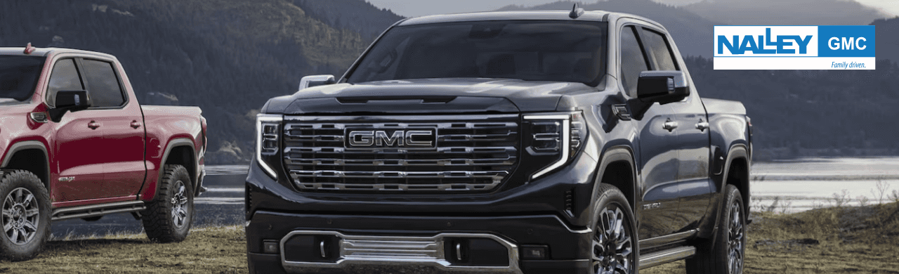 GMC Sierra 1500 lineup displayed at Nalley Brunswick GMC dealership lot in Brunswick, GA