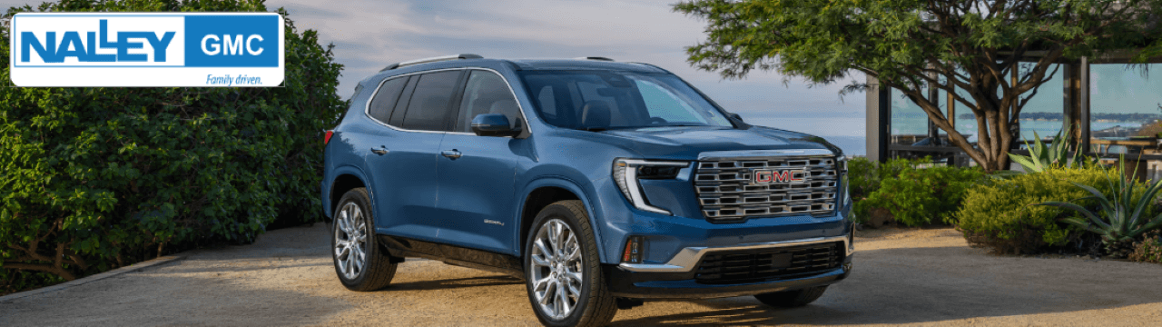 GMC Yukon Denali parked near the Georgia coastline, showcasing its bold exterior and upscale design.