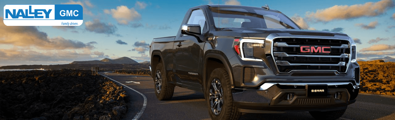 GMC Sierra Denali and AT4 models at Nalley Brunswick GMC dealership in Glynn County