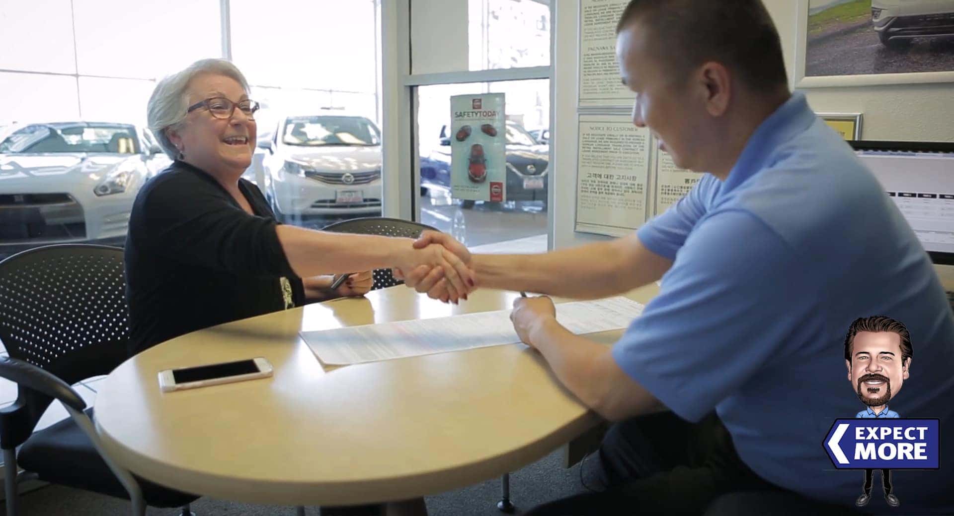 car owner bringing a vehicle in for service at a dealership