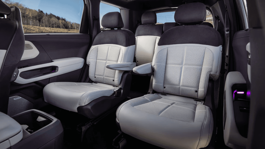 2027 Kia Telluride interior second-row captain’s chairs with armrests