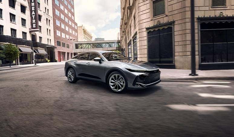 Most Fuel Efficient Toyota Models at Palmiero Toyota | Grey color Toyota Crown driving down a street 