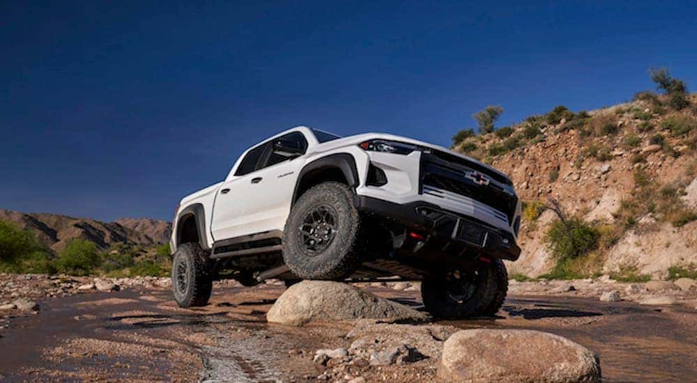 A white 2024 Chevy Colorado ZR2 Bison is shown from the front at a low angle.